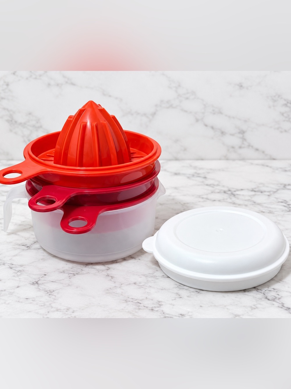 Tupperware All-In-One
Juicer/Grater/Egg
Separator Measuring
Cup Cooks Maid Set